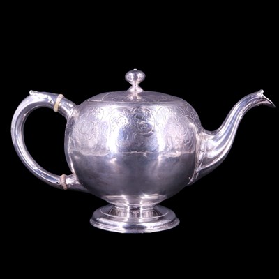 Lot 826 - A George II Scottish silver teapot and stand,...