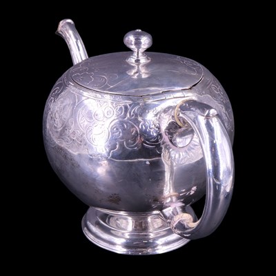 Lot 826 - A George II Scottish silver teapot and stand,...