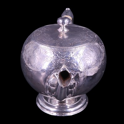 Lot 826 - A George II Scottish silver teapot and stand,...