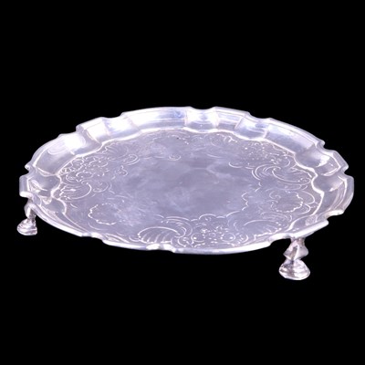 Lot 826 - A George II Scottish silver teapot and stand,...